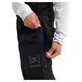 Detailed cropped view of a man wearing the Burton AK Swash Gore-Tex 2L Snowboard Pants in black