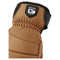 Hestra Leather Fall Line glove with elastic wrist, black logo patch, and neoprene cuffin colour Cork.
