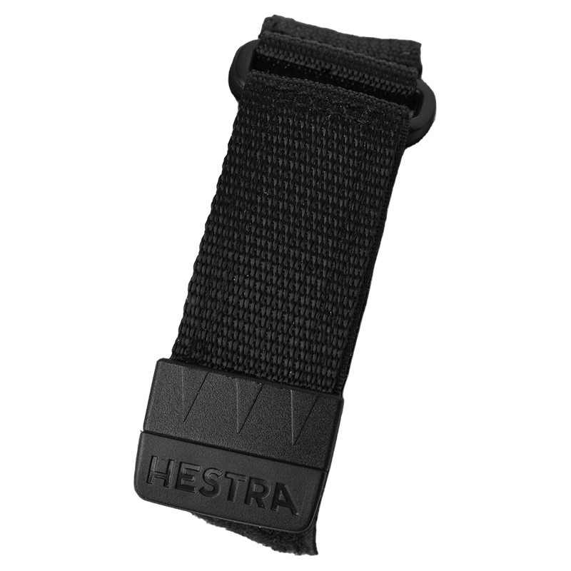 Black Hestra adjustable wrist strap with woven nylon webbing and embossed logo for Heli Ski Mitts.