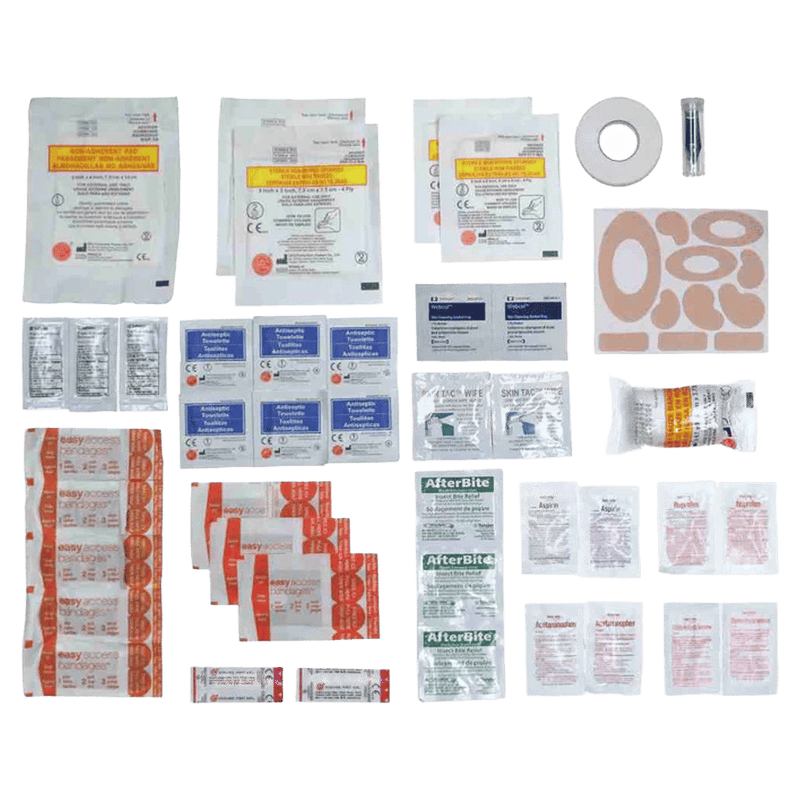 Contents laid out of the Adventure Medical Ultralight First Aid Kit showing various bandages, swabs, bite wipes, blister patches, tape, forceps etc.
