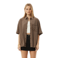 Woman wearing Afends Hometown Short Sleeve Shirt in coffee colorway