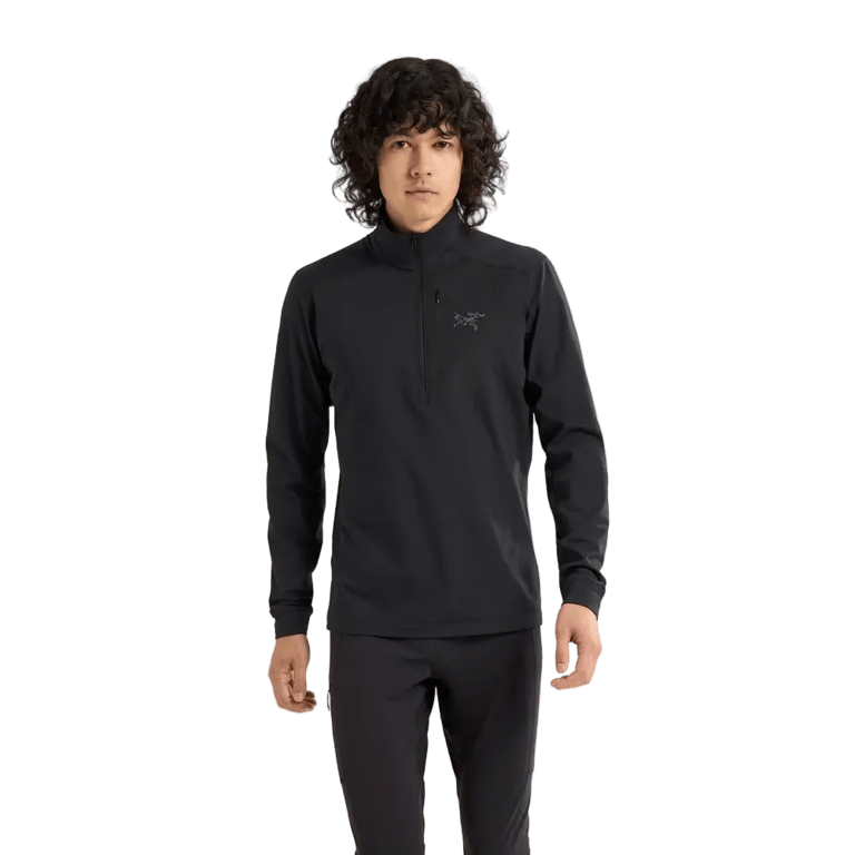 Cropped front view of a man wearing the Arcteryx Rho LT Zip Neck in Black