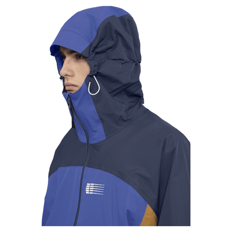Hood view of the Armade Ansel 2L Shell Jacket in Dazzler, Navy and Golden Brown colourway, unisex's model