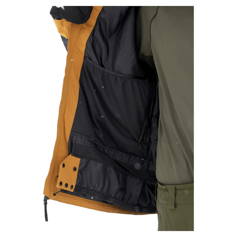 Pocket view of the Armada Bargs 2L Insulated Jacket in Dazzler colourway, unisex's model