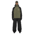 Full-body view of the Armada Gansett 2L Insulated Jacket in olive, black and cream colourway, unisex's model