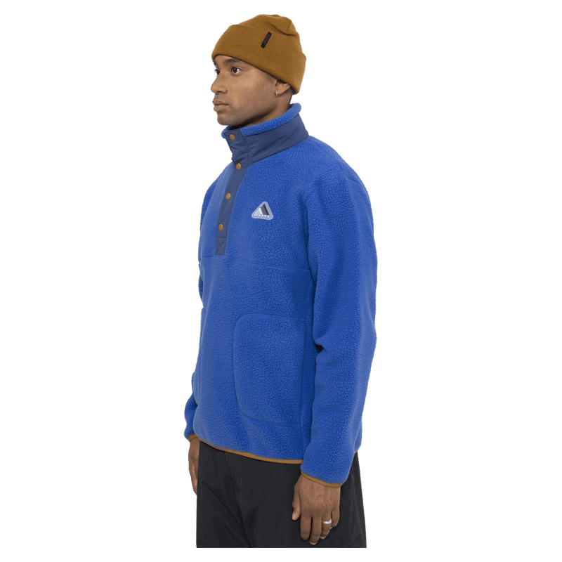 Side view of the Armada Kenlem Fleece Popover in Dazzler colourway, unisex's model