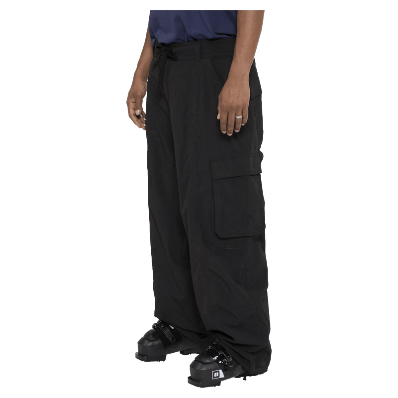 Side view of the Armada Team Issue 2L Cargo Pant in Black colourway, men's model