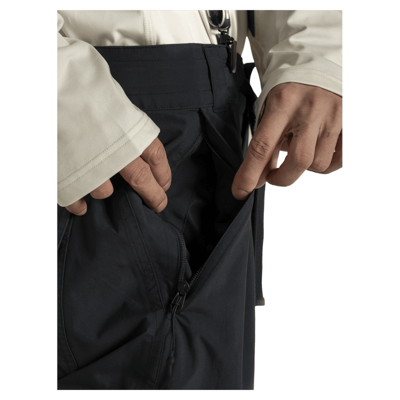 Pocket view of the Armada Team Issue 2L Cargo Pant in Black colourway, men's model