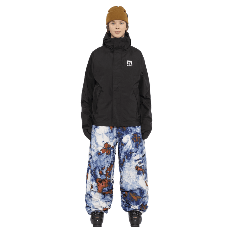 Full-body view of the Armada Team Issue 2L Pant in Acid House colourway, men's model