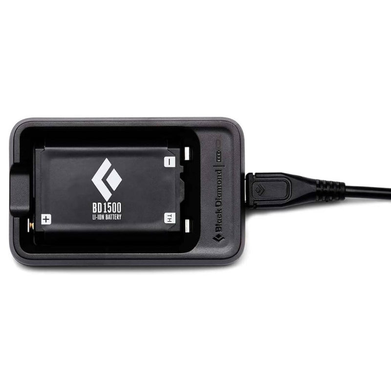 Black Diamond 1500 Battery sitting within the charger with black charger cord