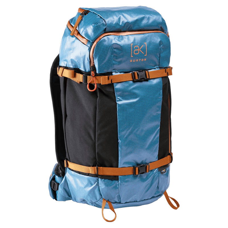 Blue and black Burton AK Dispatcher backpack with orange straps, shiny ripstop fabric, and multiple buckles.