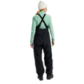 Back view of black Burton Reserve Bib Snowboard Pants for women with adjustable cross-back straps and a relaxed fit.