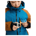 Chest pocket view of the Burton AK Embark Snowboard Jacket in Blue Teal and Chestnut colourway, women's model