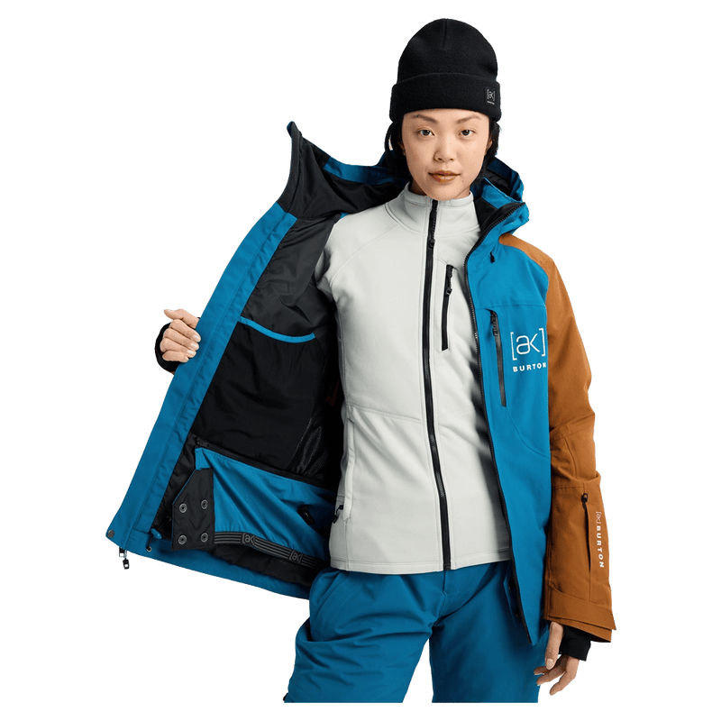 Inside view of the Burton AK Embark Snowboard Jacket in Blue Teal and Chestnut colourway, women's model
