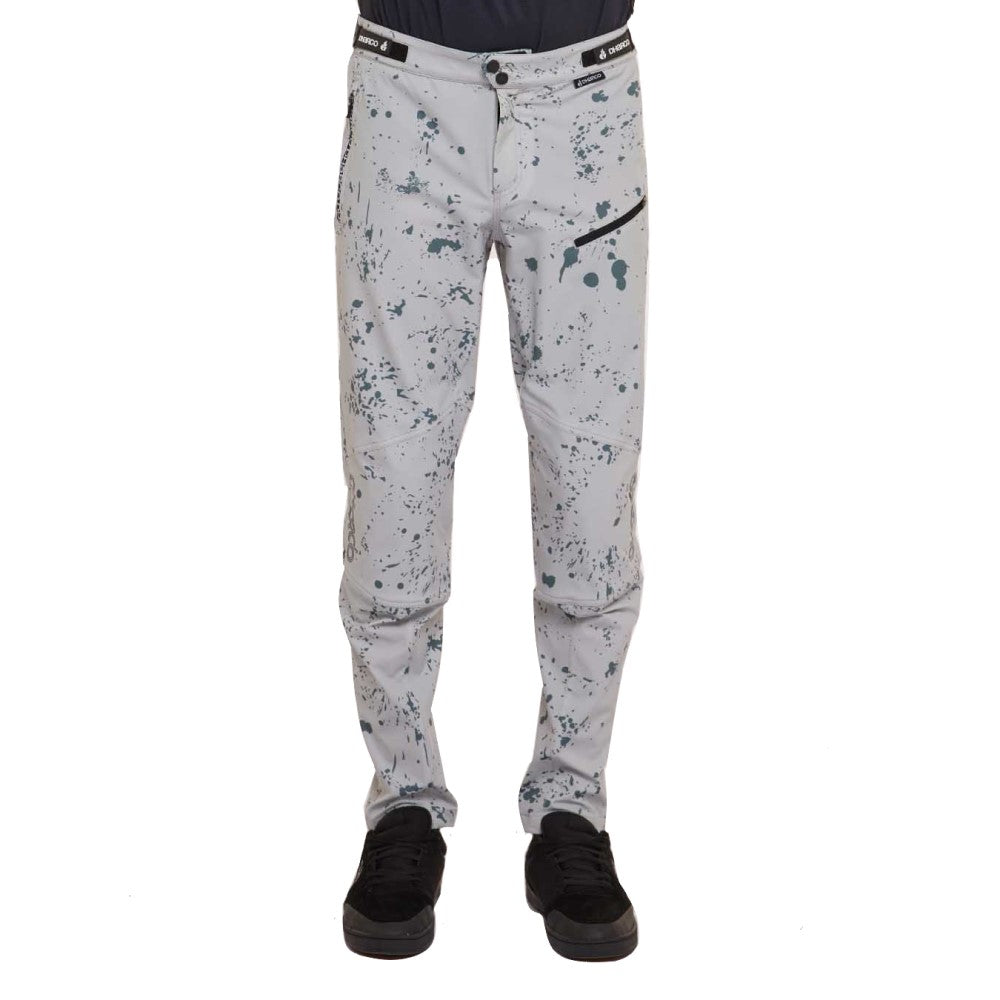 Men's mtb pants in grey with dark grey splatter design.