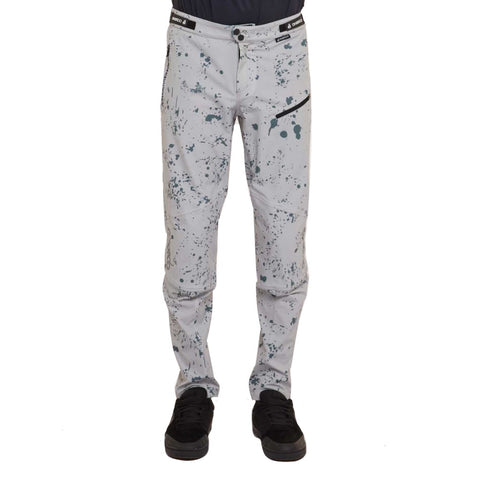 Men's mtb pants in grey with dark grey splatter design.