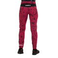 Women's bike pant red with black splatter back view.