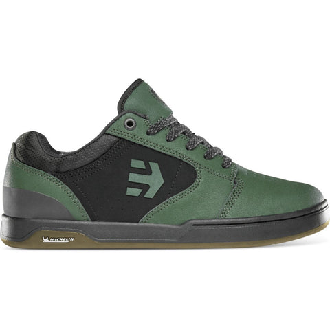 Green and black mountain bike shoes.