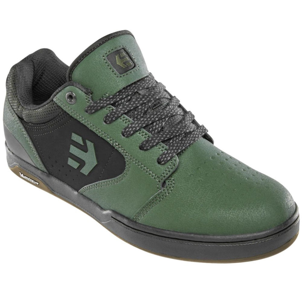 Green and black mountain bike shoes.