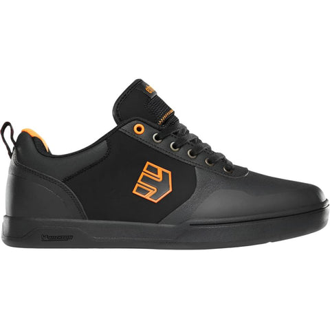 Black mountain bike shoe with orange logo.