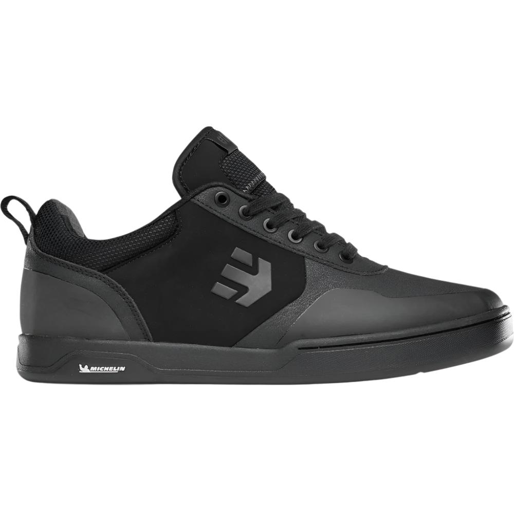 All black mountain bike shoe.