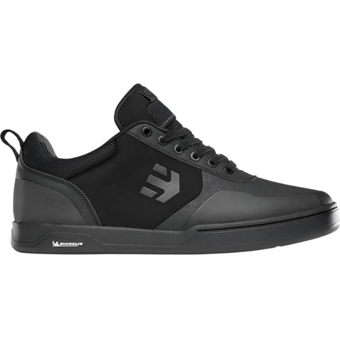 All black mountain bike shoe.