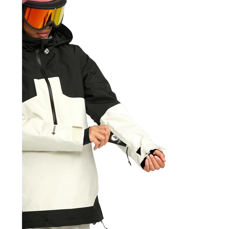 Detail image of the Fern Ins Gore Pullover Snowboard Jacket - Womens in Bone. Featuring left side pass pocket.