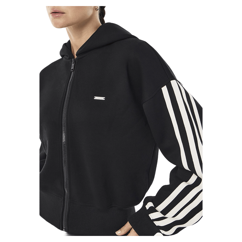 Side view of P.E Nation Flip Side Zip Thru Hoodie in colour Black