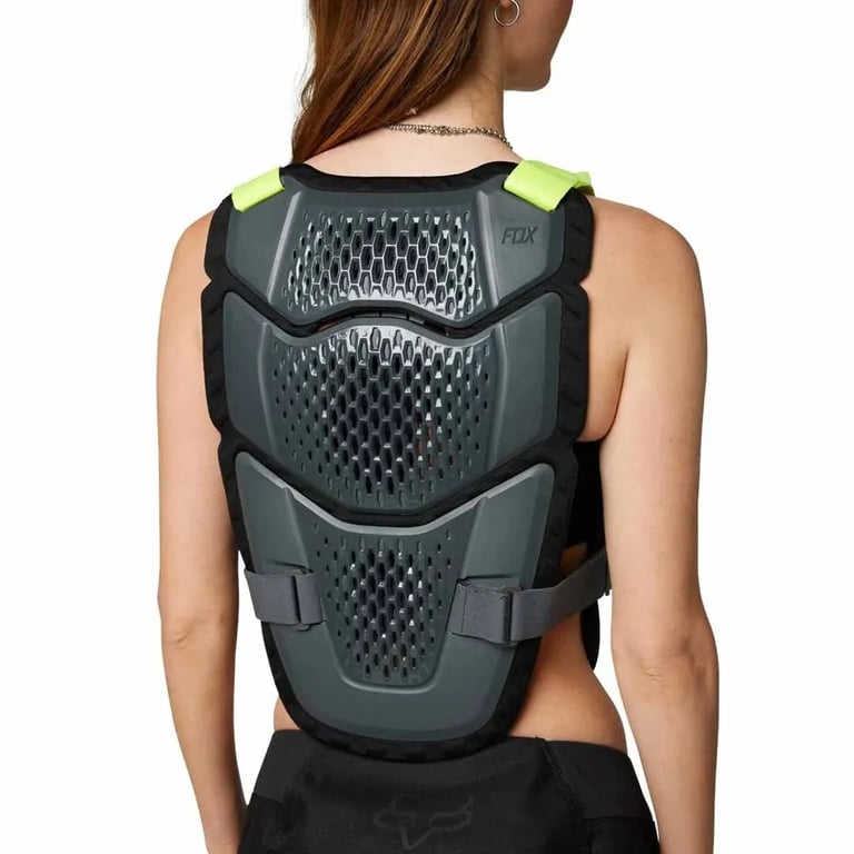 Fox Raceframe Impact Guard back protector in grey with honeycomb vents, black padding, and neon yellow shoulder straps.