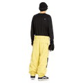 Rear view of yellow Volcom Longo Gore-Tex baggy snowboard pants with a relaxed fit and back pockets.