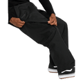Black Volcom Kleveland snowboard pants with a zippered mesh thigh vent for ventilation.