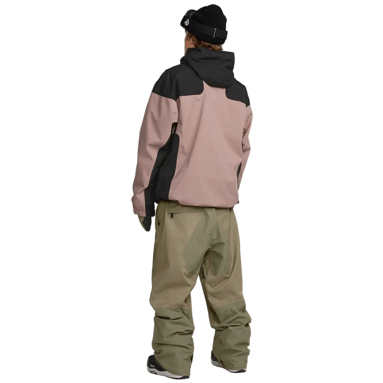 Rear view of olive green Volcom Kleveland snowboard pants featuring a relaxed fit and zippered back pocket.