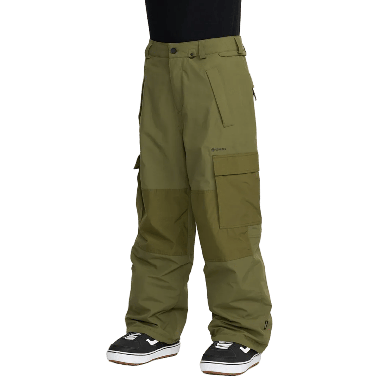 Olive green Volcom Longo Gore-Tex snowboard pants with cargo pockets and a loose fit, shown from a three-quarter view.