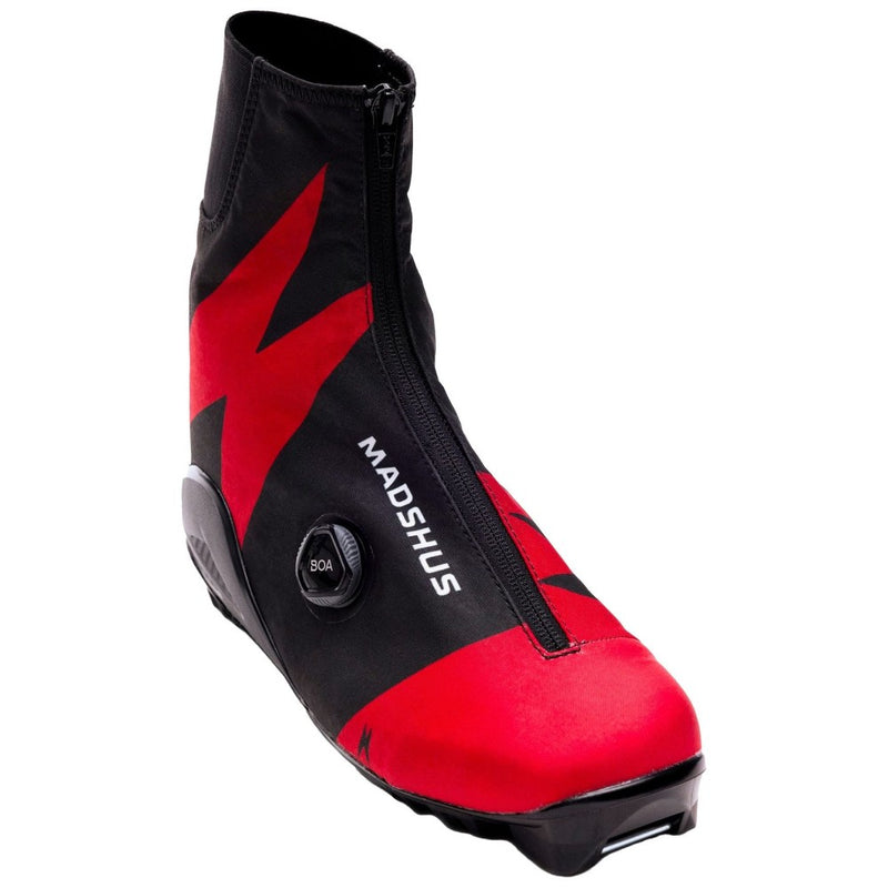 A single Madshus Pulse Boa Classic Cross Country Ski boot in red and black with zipper front and boa on the side