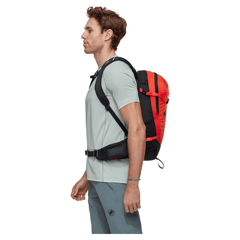 Side view of the Mamut Lithium 15 Backpack in Black hot Red colourway, unisex's model