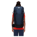 Carried view of the Mamut Lithium 40L Backpack in Sapphire Black colourway, women's model