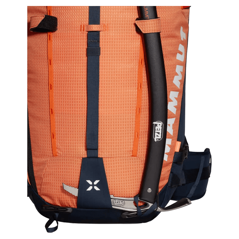 Detail view of the Mamut Trion 38L Backpack in Arumita and Marine colourway, unisex's model