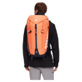Carried view of the Mamut Trion 38L Backpack in Arumita and Marine colourway, unisex's model