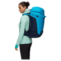 Side view of the Mamut Trion Nordwand 38L Backpack in Sky and Night colourway, women's model