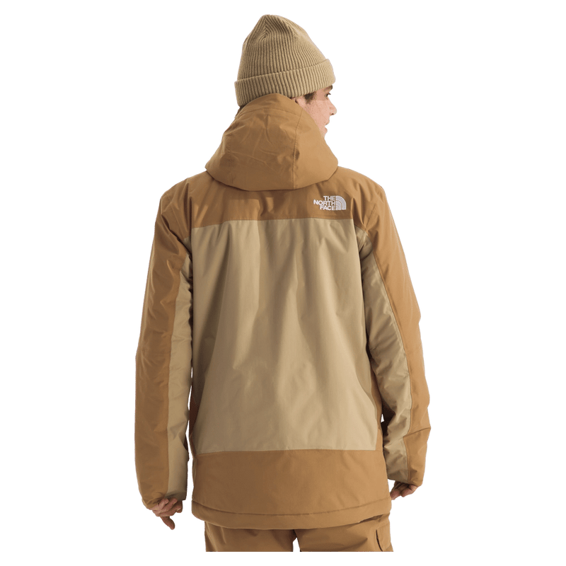 Man wearing The North Face Freedom Insulated Ski Jacket in Utility Brown-Khaki Stone