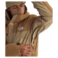 Man wearing The North Face Freedom Insulated Ski Jacket in Utility Brown-Khaki Stone