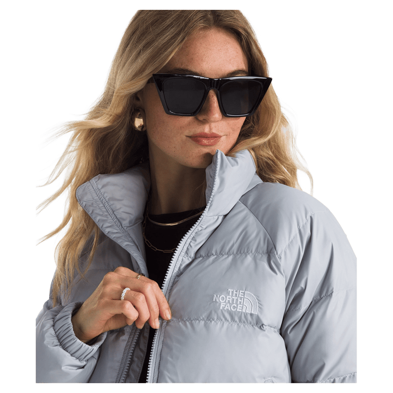 Woman wearing The North Face Hydrenalite Down Jacket in Blue Flax