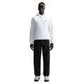 Front view of the Nike Club Cargo Pants in Black colourway, unisex model