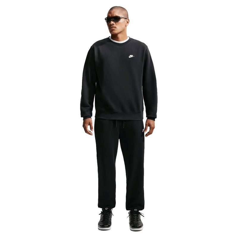 Front view of the Nike Club Track Pants in Black and White colourway, unisex model