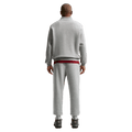 Back view of the Nike Club Track Pants in Dark Grey Heather and light Smoke colourway, unisex model