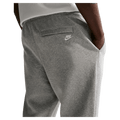 Detail view of the Nike Club Track Sweatpants in Dark Grey Heather and light Smoke colourway, men model