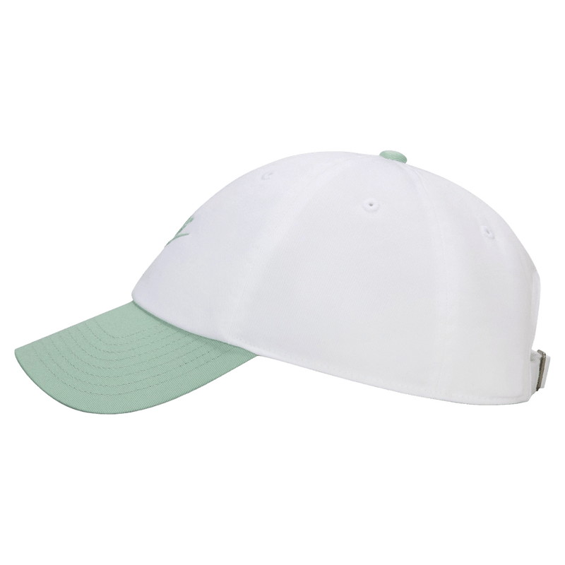 Side view of the Nike Club Cap in White and Steam colourway, unisex model