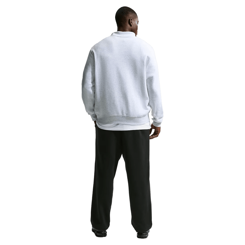 Back view of the Nike Club Fleece Pants in Black colourway, men model