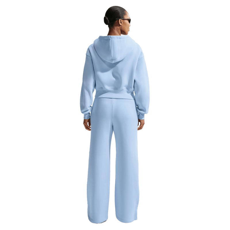Back view of the Nike Phoenix Fleece Sweatpants in Hydrogen Blue colourway, women model