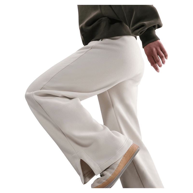 Detail view of the Nike Phoenix Fleece Sweatpants in Light Orewood Brown colourway, women model
